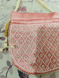 Regal Pink Pearl Potli Bag with Embellished Handle
