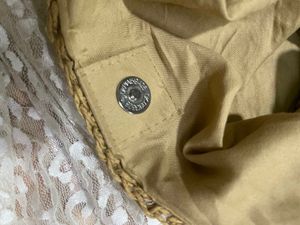 Woven straw shoulder bag