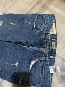 Distressed Wide-Leg Jeans