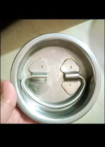A  Steel Milk Can Or Container