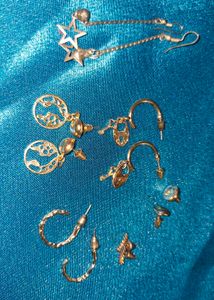Assorted Gold Tone Earrings and Silver Rings