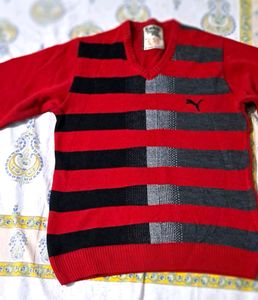 Branded red color sweater for men.