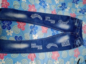 Distressed Denim Jeans