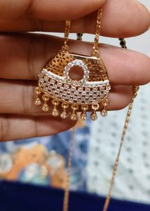 ad mangal Sutra with earing