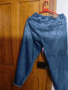 Ripped Blue Denim Jeans