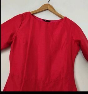 Bright red long kurti by the brand Indya in S size