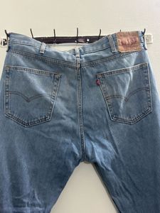 Ripped Knee Jeans