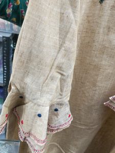 Golden Kurti With Hand Embroidry.... Totally New Never Been Used