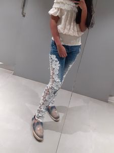 Denim jeans With Floral Pattern