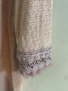 Tunic With Feather Detailing