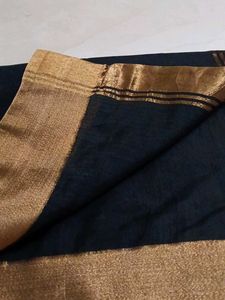 Black saree with golden sare