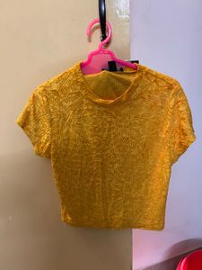 Brown off-shoulder ruffle top