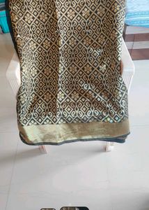 Elegant Black & Gold Saree