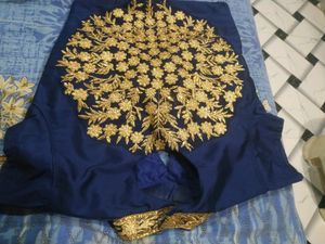 women peach and blue crop top skirt with duptta