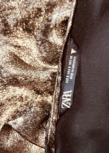 Long foil Backless  Dress With flower Detail