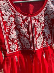 A beautiful red chikankari short kurti