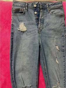 Ripped Light Wash Jeans