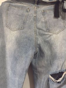 Ripped Light Wash Denim Jeans