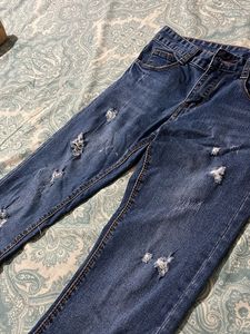 Distressed Denim Jeans