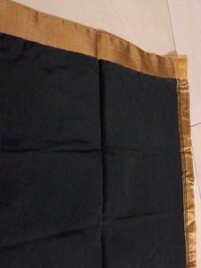 Black saree with golden sare