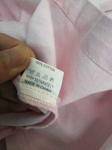 Baby pink button-down shirt