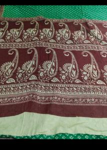 Elegant Green Saree with Flower Design