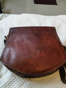 raw leather slingbag