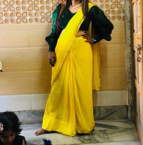 yellow saree with green blouse