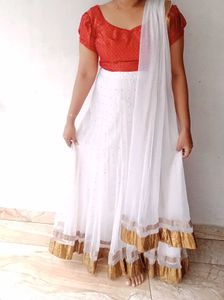 White Net Lehanga And Red Prince Cut Blouse