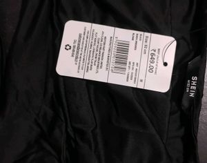 Sleek Black Cutout Bodycon Dress. Size :- M