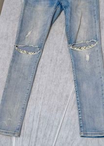 Ripped Knee Denim Jeans