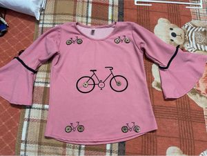 Pink Top With 3D Buttons And Umbrella Sleeves