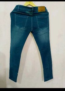 Ripped Blue Denim Jeans