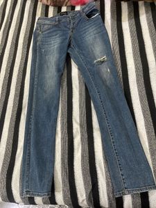 Distressed Denim Jeans