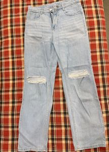 Ripped Light Wash Denim Jeans