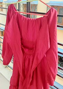 A Beautiful  Maroon Dress With Back Tiers