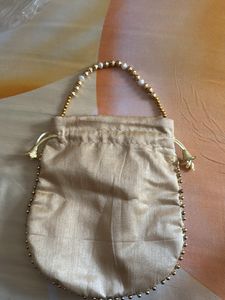 Embroidered Golden Potli