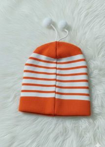 Striped Beanie with Pom Poms