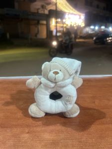 plush bear rattle, soft toy with a rattling Sound