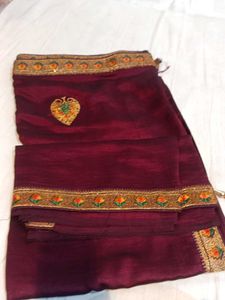 Elegant Maroon Saree with Gold Embroidery