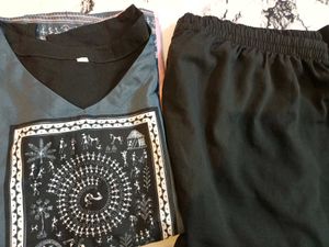 Elegant black printed Kurta Set with off shoulder