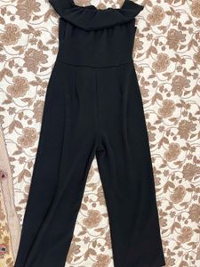 Elegant Black Strapless Jumpsuit with Bow Detail