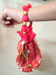 lowest price red and golden potli bag