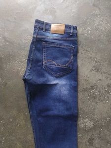 Ripped Blue Denim Jeans