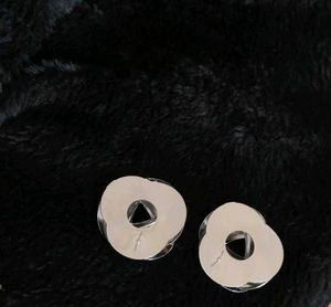 Silver Toned Spiral Curved Earings - 1 Pair