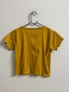 Title:Mustard Yellow Ribbed Lettuce Hem Crop Top