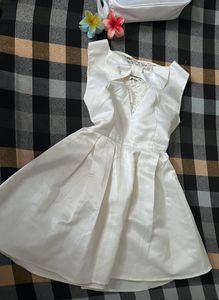 Pretty White Dress With Back Bow Design