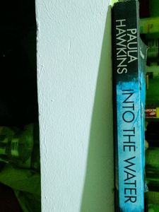 INTO THE WATER. PAUL HAWKINS. FROM THE BESTSELLING AUTHOR OF THE GIRL ON THE TRAIN.