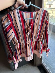A beautiful peplum top with stripes🎀