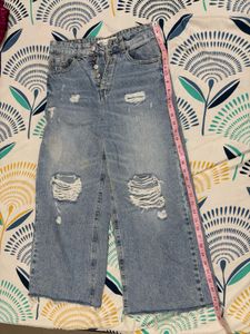 2 Pair Of Ripped Wide Leg And Straight Jeans